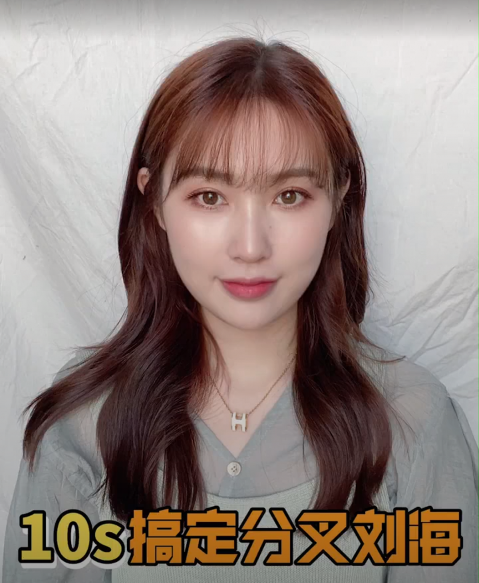 4、最后等待几秒中散散热定型，用梳子将刘海梳整齐就完成啦！