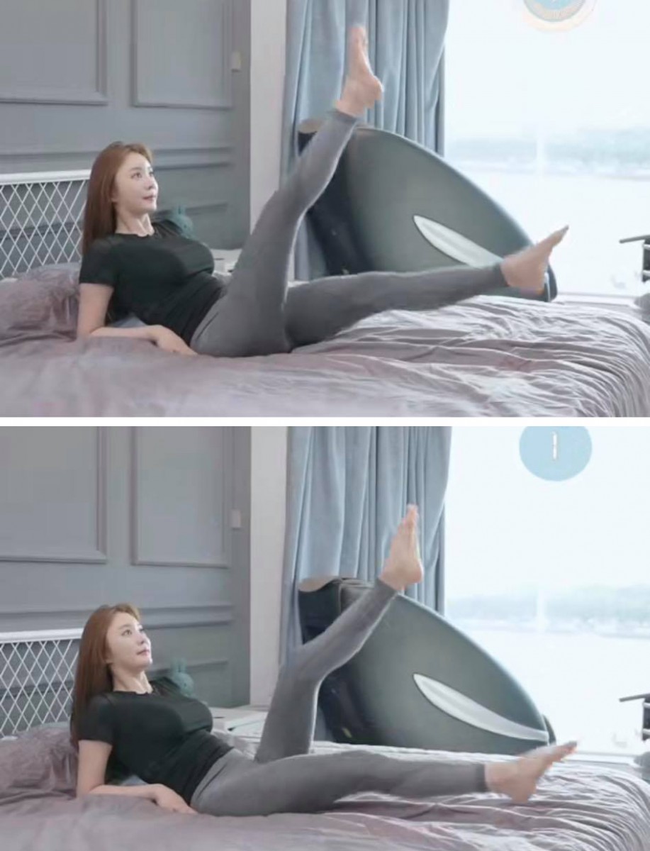 动作(二)仰卧上下抬腿 仰卧后身子抬离瑜伽垫或床面,双手紧贴表面支撑;双脚脚尖稍稍踮着,匀速进行上下抬腿。一组20次、共做3组。看似简单的这组动作很有感瘦腿+瘦腹哟!