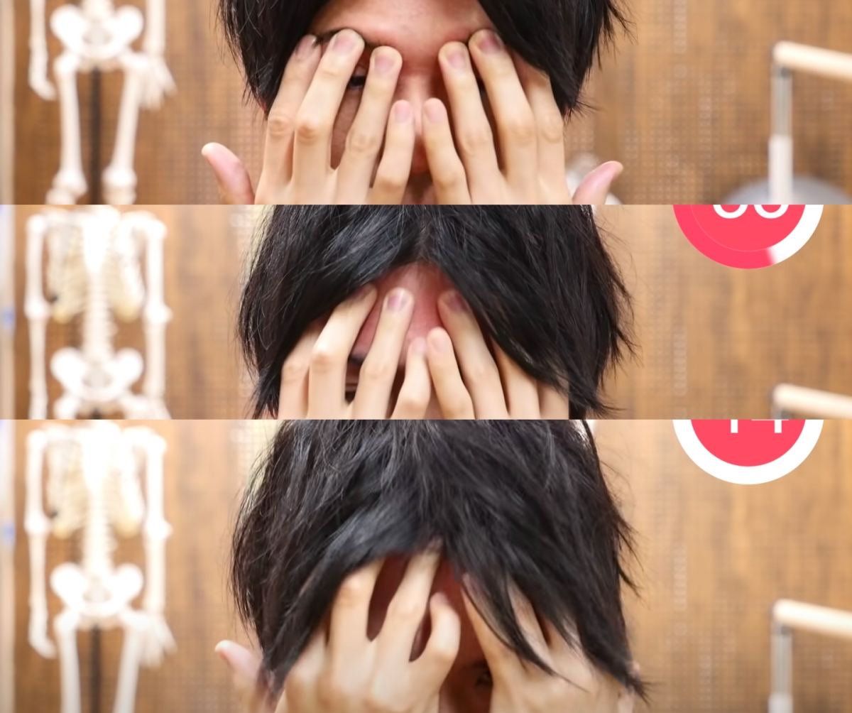 动作(五) 眉毛对上的整个额头部分进行按摩;从靠近眉毛处开始,双手指腹地紧贴抵住额头皮肤上下按摩,之后一直循着向上分点重复按摩动作至发际线位置;共做1分钟。