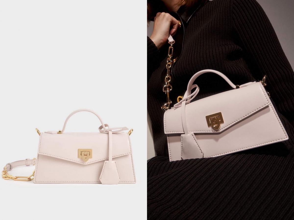 # 8 Trapeze Top Handle Bag 梦幻甜美配色赋予了这款包包满满春夏活力气息;金属细节、同款皮革吊饰超加分。和柔美的棉花糖粉色映衬出气质温柔而不娇揉的气质。虽然整体包款大走简约设计风格,但十分亮眼、回头率十足!(参考价格 RM279.90)>>> 【点击前往官网查看能多详情】