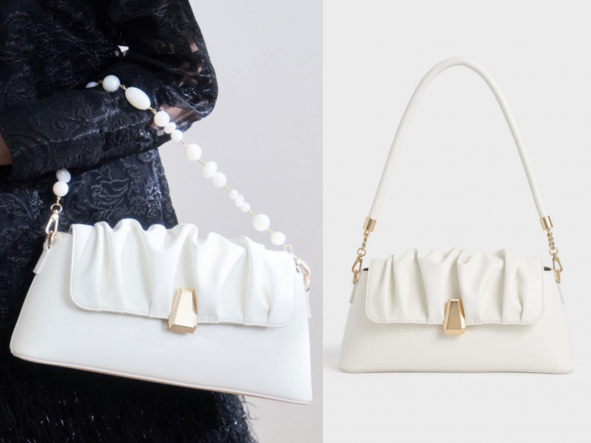 # 2 Charles & Keith Beaded Strap Ruched Trapeze Bag 串珠抓皱梯形包 >>> 【点击查看官网链接】 包包掀盖的部分缀以软绵绵云朵feel的抓皱设计以及简约梯形金属扣,手提带方面除了皮革款,还配有另一款串珠装饰设计,换成后者瞬间从优雅都市女伶摇身变成元气少女感休闲LOOK