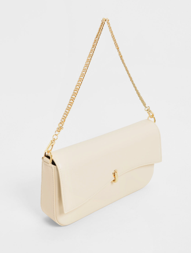  大小偏中型的简约设计肩背包特别显知性温柔气质，配色和整体廓形无论通勤使用或出席重要场合都很百搭，搭配裙装、裤装都能展现优雅魅力！>>>【点击前往官网入手】