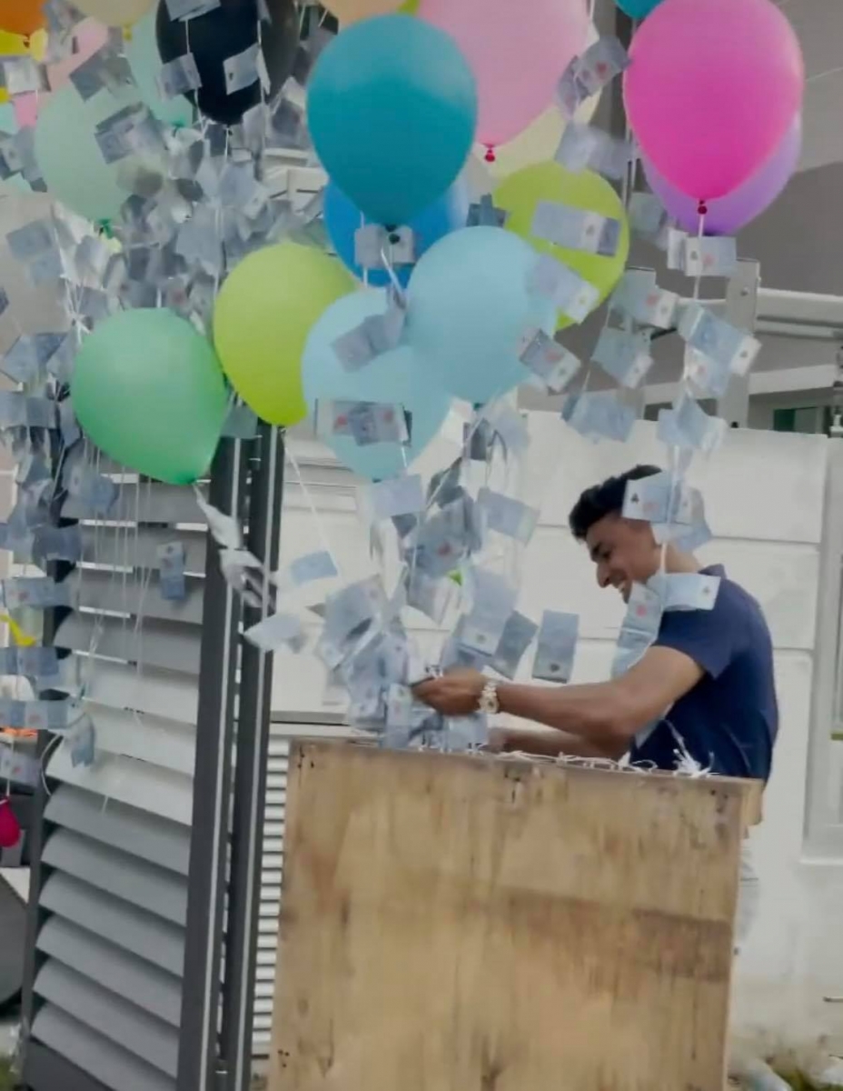 马来西亚网红将1万令吉现金绑气球升空事件引发争议。