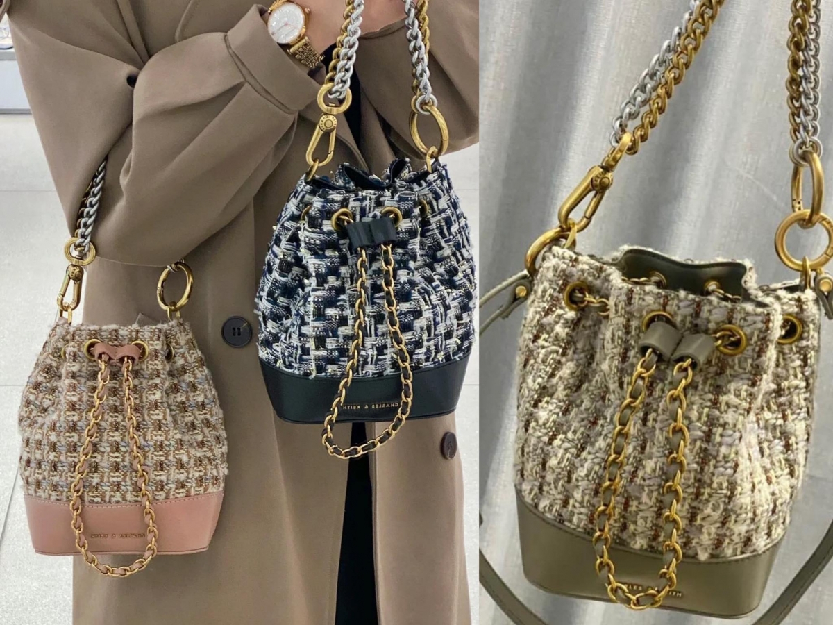 超懂少女心的小CK在小巧水桶包上缀以粗花呢x细致皮革拼接设计,共推出了3款颜色:粉色调款清新甜美、茶色气质百搭、海军蓝色优雅迷人。