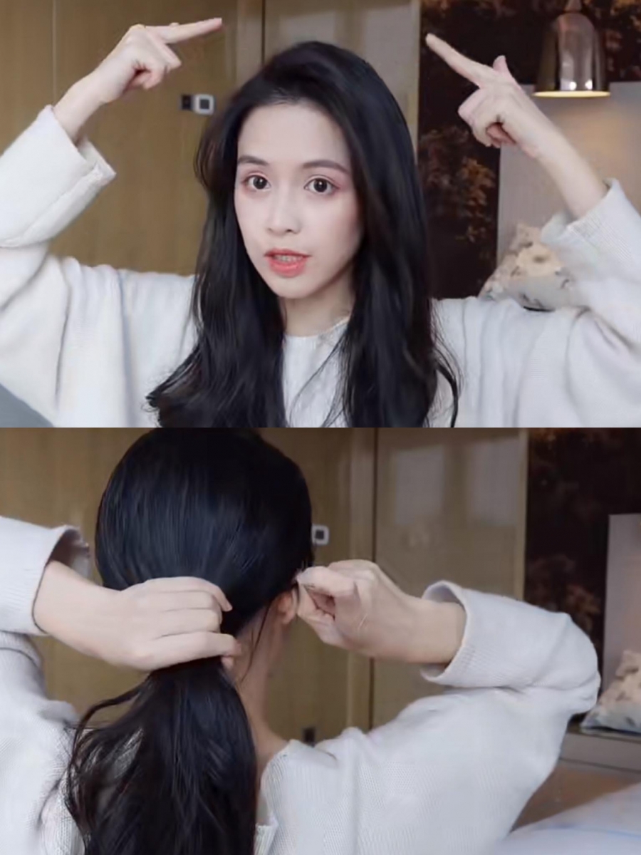 赵露思同款鲨鱼夹发型:1、先侧分头发用以达到颅顶增高显脸小的效果;接着把头发往后抓成低马尾状态。