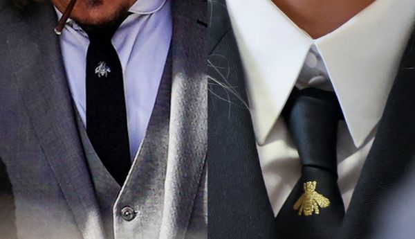 不料隔天12日,Amber Heard也立马穿上灰色西装,并在13日当天,也同样搭配了一条有昆虫图案的领带。