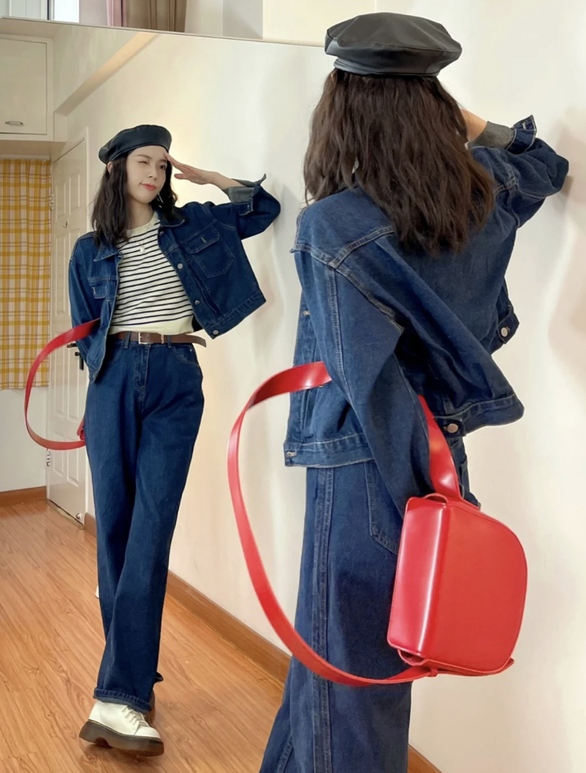 选择短款的牛仔外套搭配牛仔长裤真的很显比例,一身牛仔穿出满满的时尚感