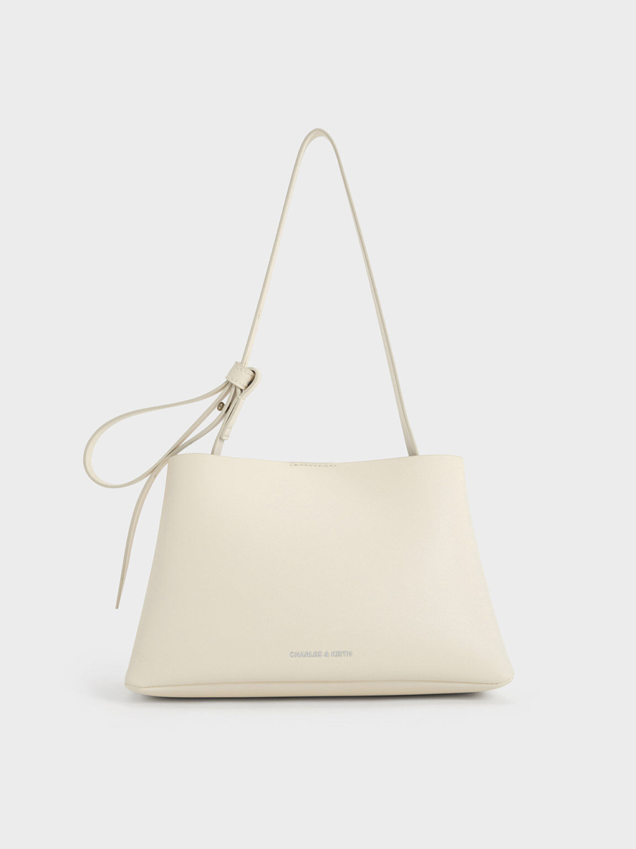 1、Odella Trapeze Bucket Bag