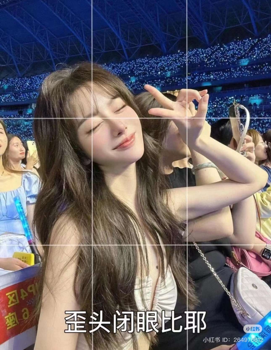 和拍摄者互动比心