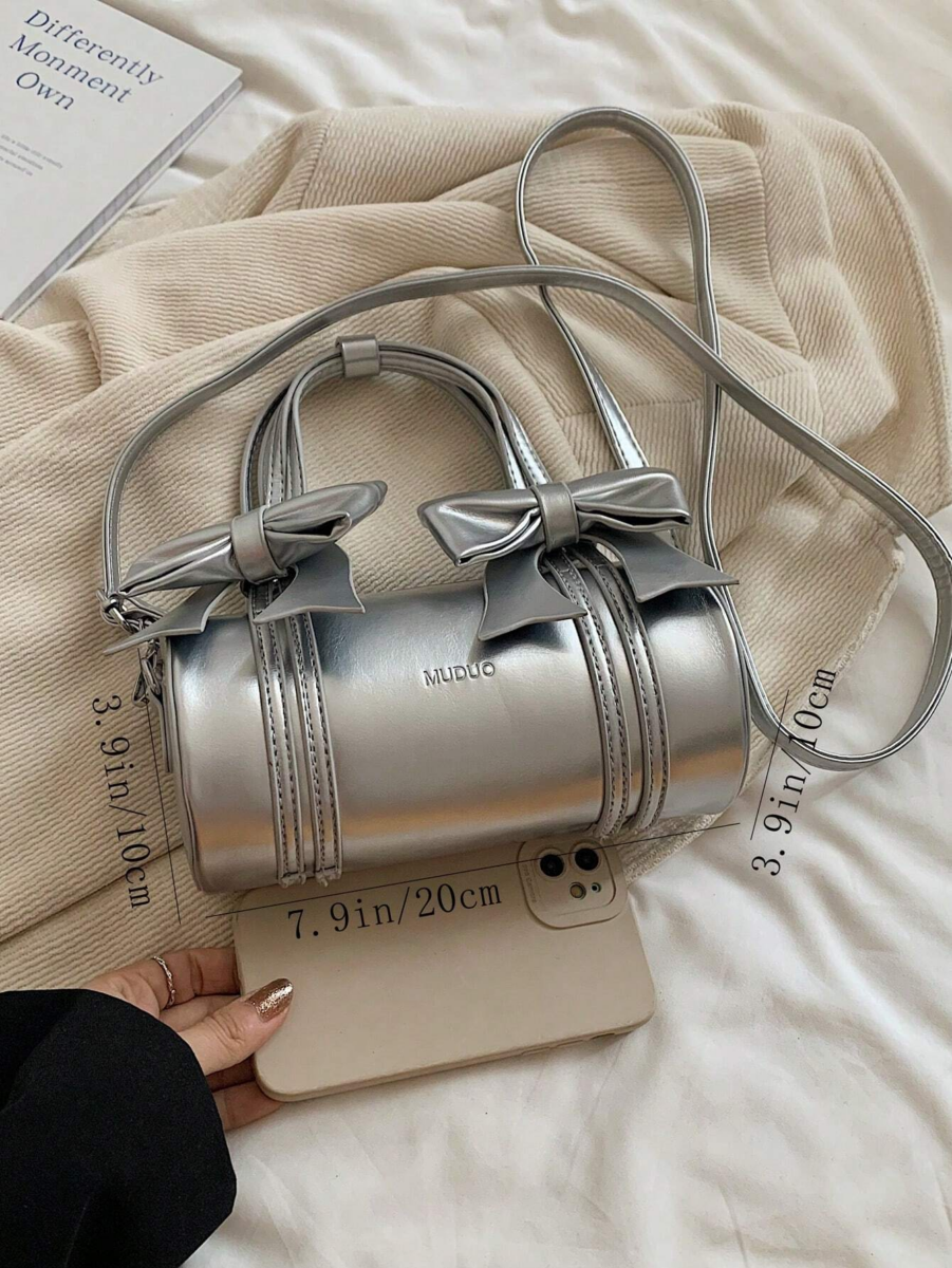 4、SHEIN Manny 银色 Y2K 蝴蝶结圆筒包