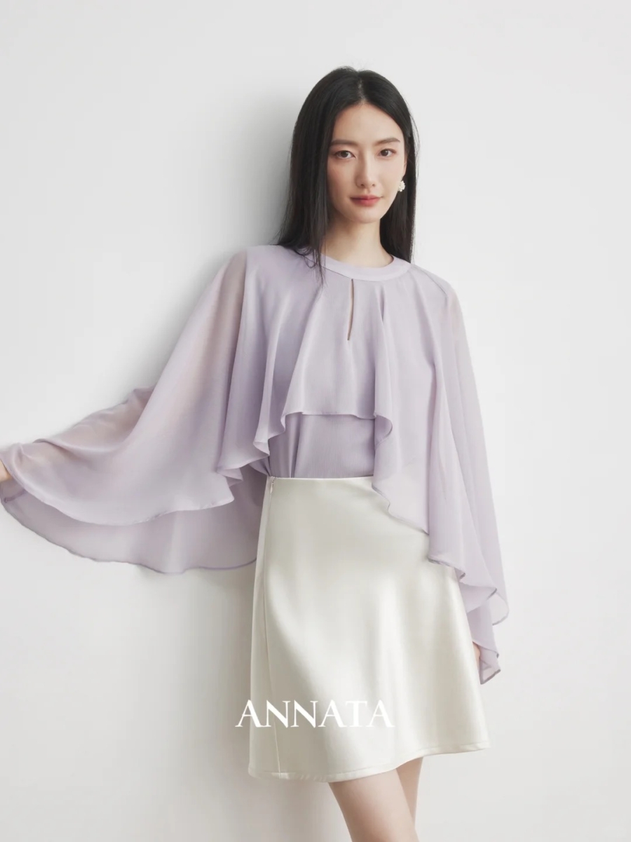 斗篷袖 / 荡领袖：利用面料垂坠感遮肉